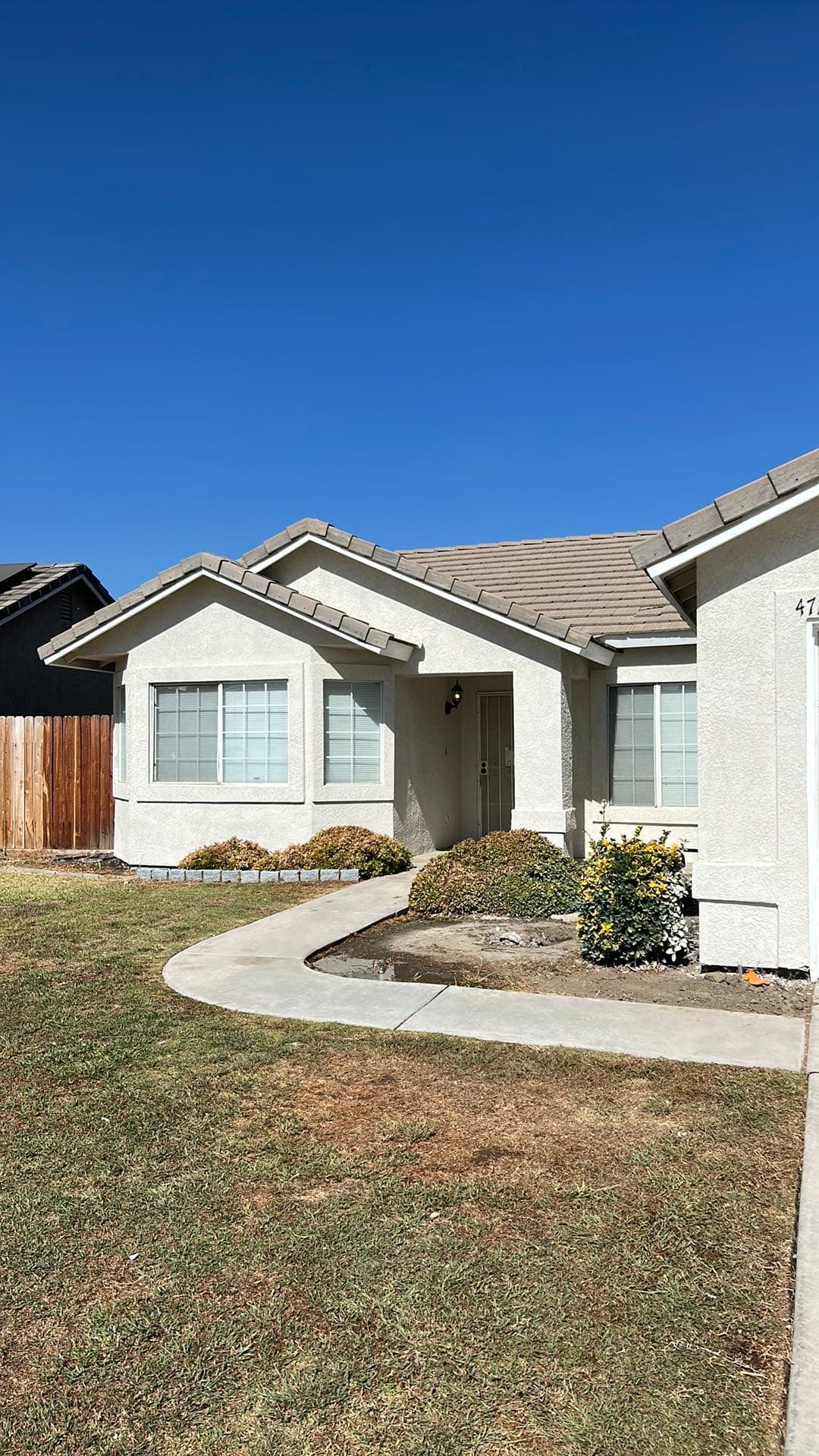Completed exterior renovation of Bakersfield home we bought for cash