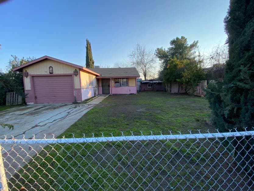 Exterior of Central Valley home we purchased for cash