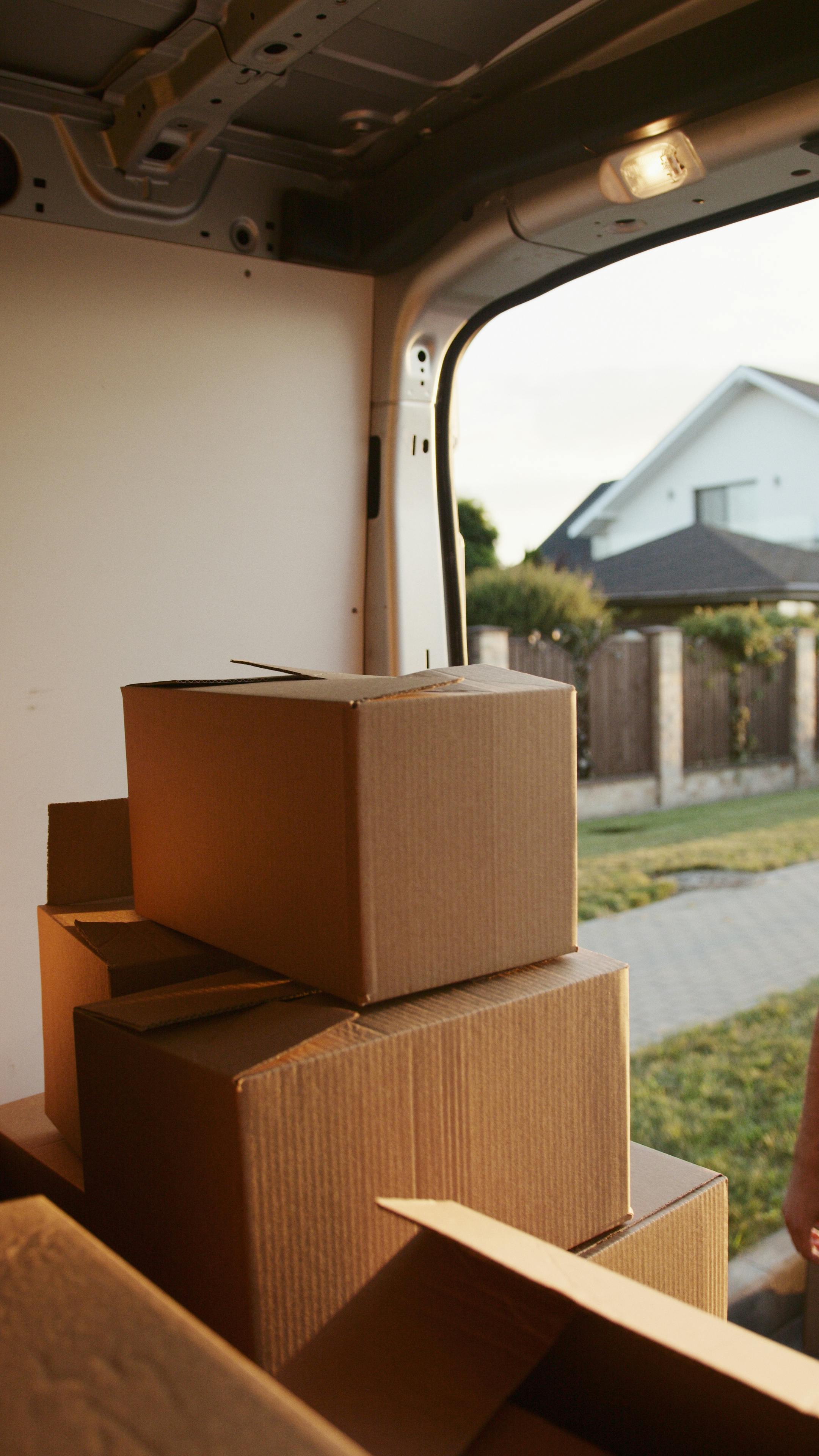 Moving boxes packed in van leaving California home