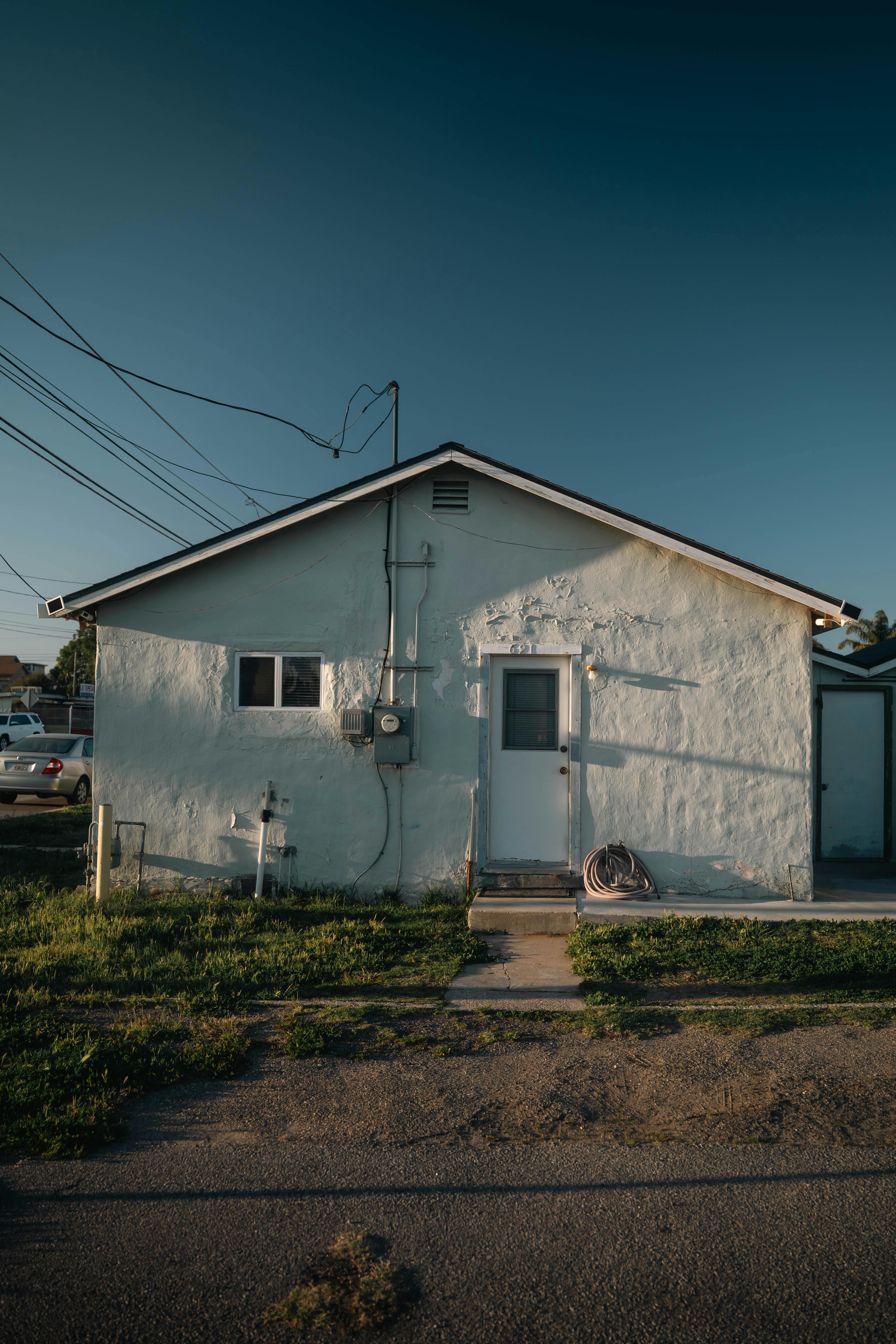 Older California home exterior sold as-is
